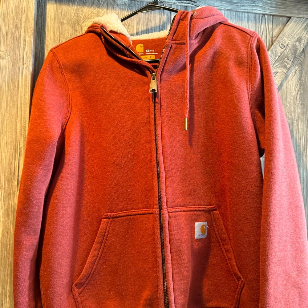 Carhartt zip-up hoodie.